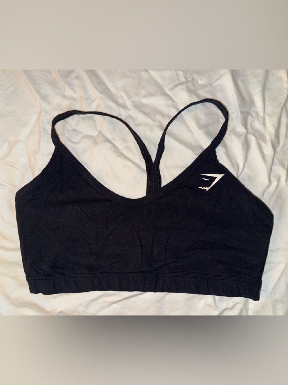 Gymshark Black V-neck Sports Bra with White Logo Accent - Medium